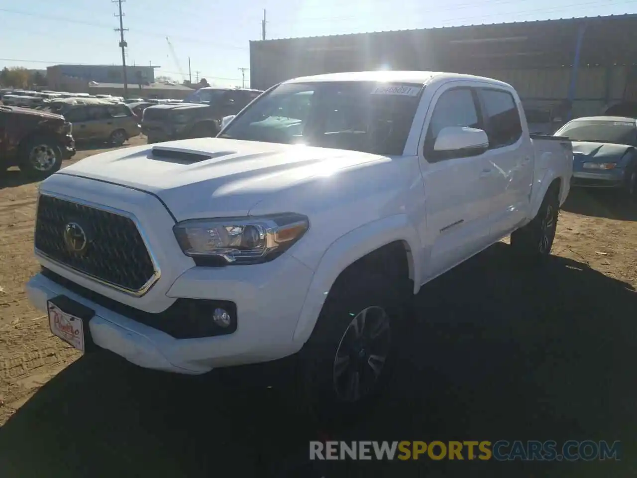 2 Photograph of a damaged car 3TMCZ5AN0KM196080 TOYOTA TACOMA 2019