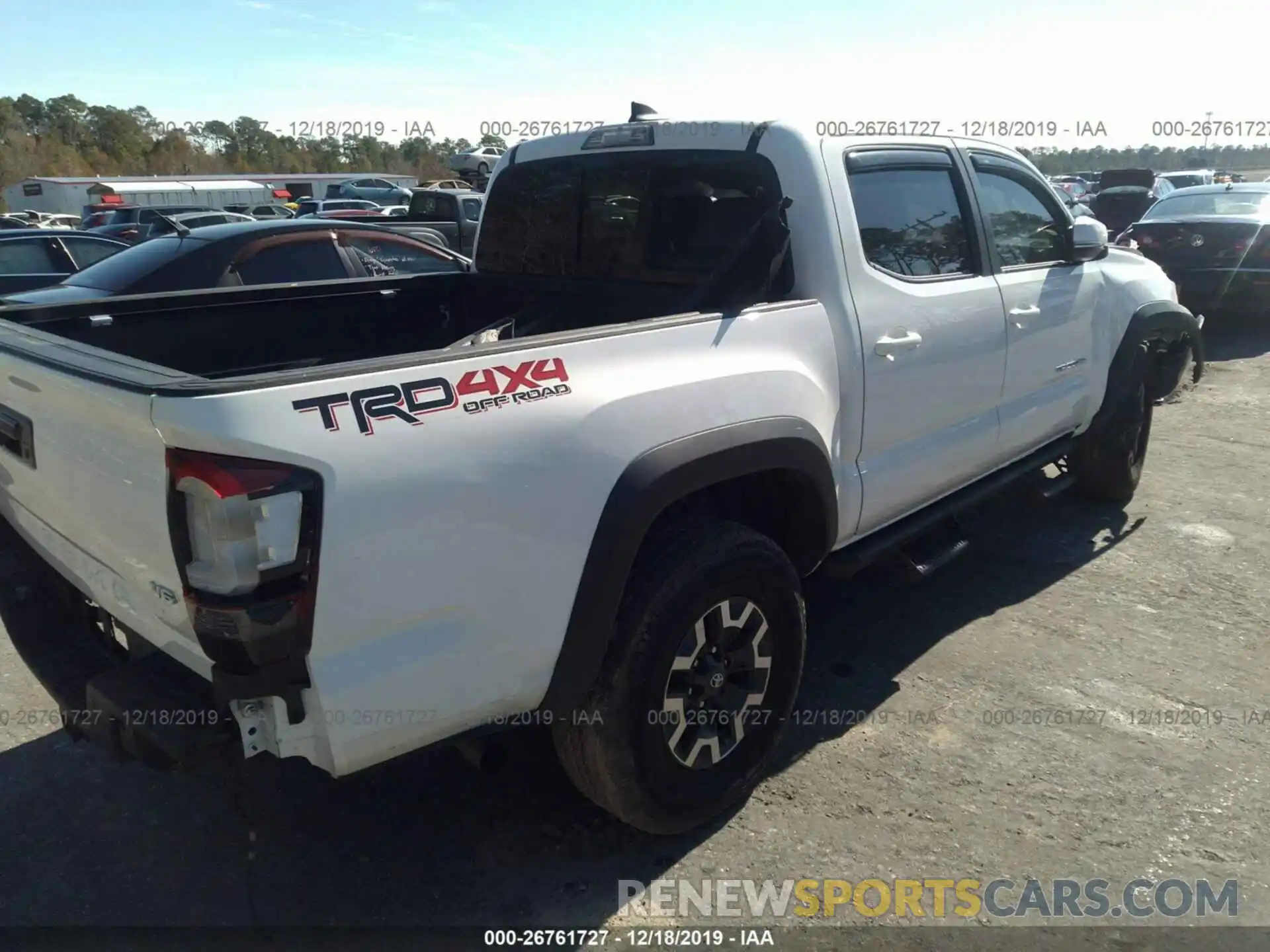 4 Photograph of a damaged car 3TMCZ5AN0KM199822 TOYOTA TACOMA 2019