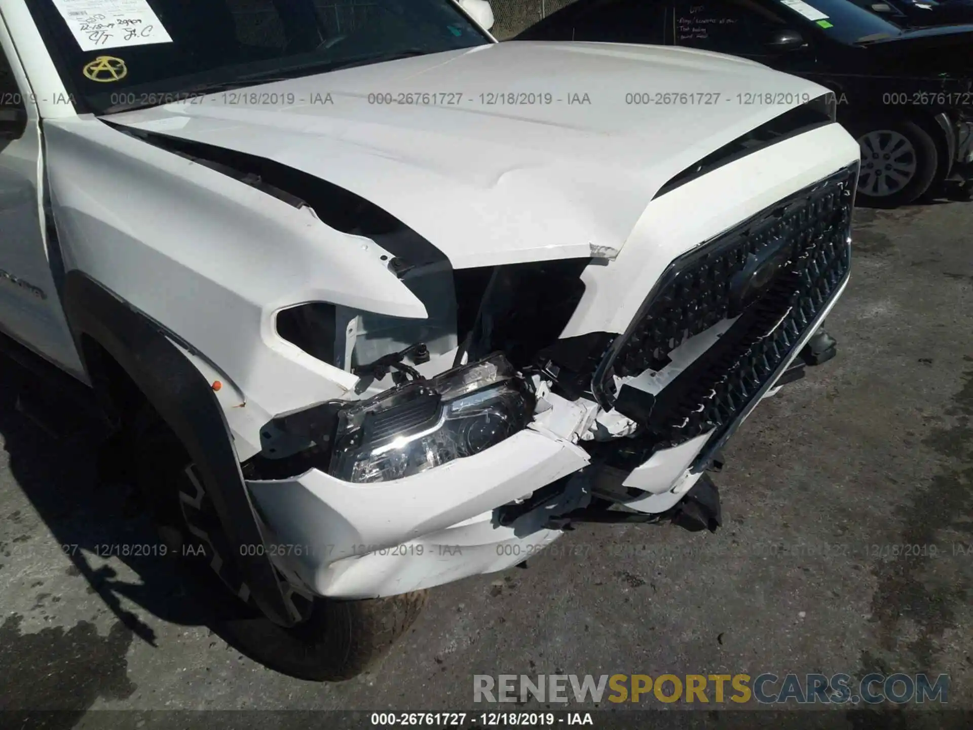 6 Photograph of a damaged car 3TMCZ5AN0KM199822 TOYOTA TACOMA 2019