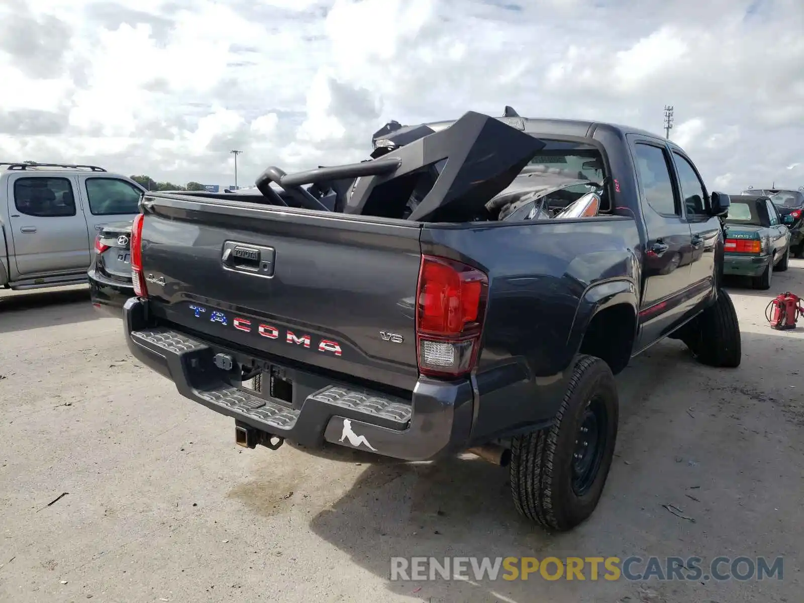 4 Photograph of a damaged car 3TMCZ5AN0KM201536 TOYOTA TACOMA 2019