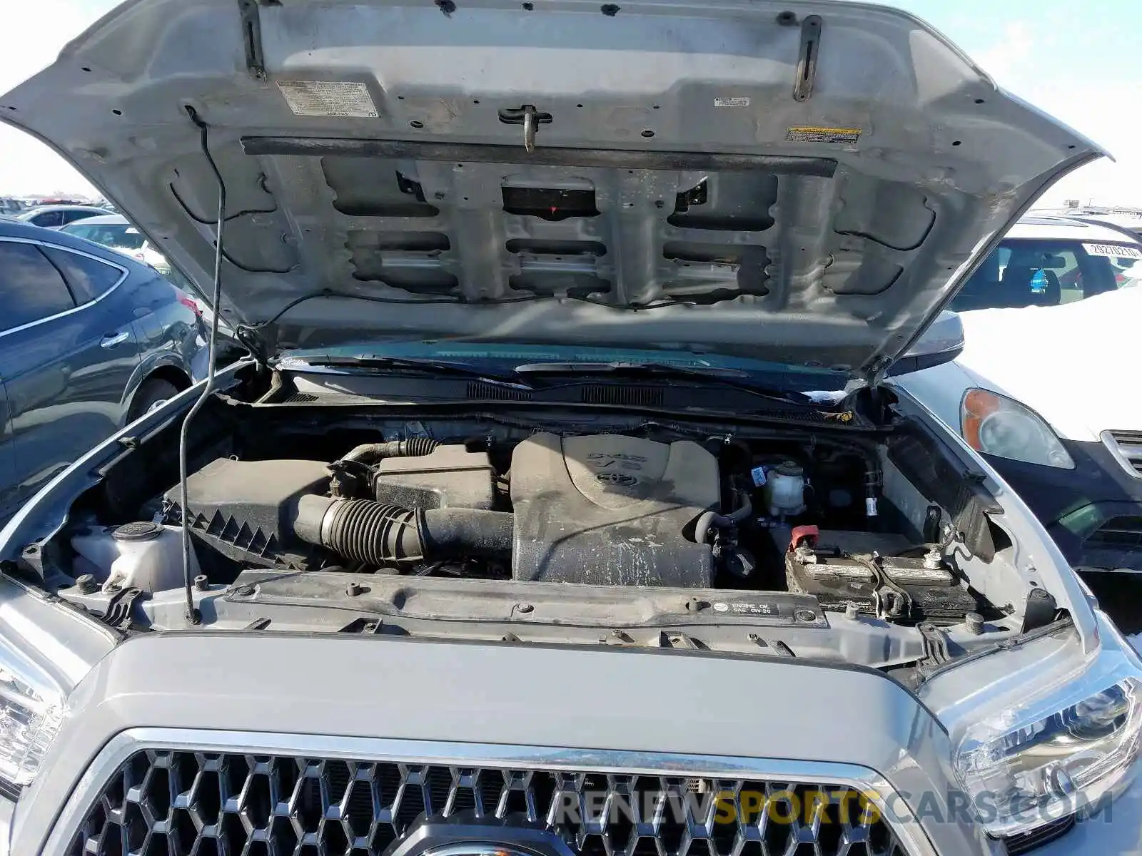 7 Photograph of a damaged car 3TMCZ5AN0KM204954 TOYOTA TACOMA 2019