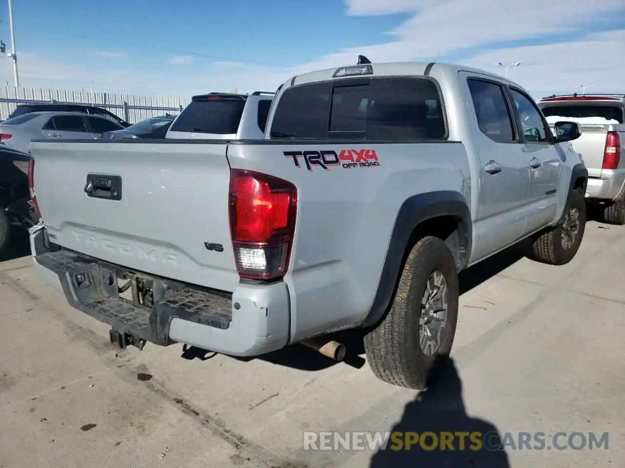 4 Photograph of a damaged car 3TMCZ5AN0KM205229 TOYOTA TACOMA 2019