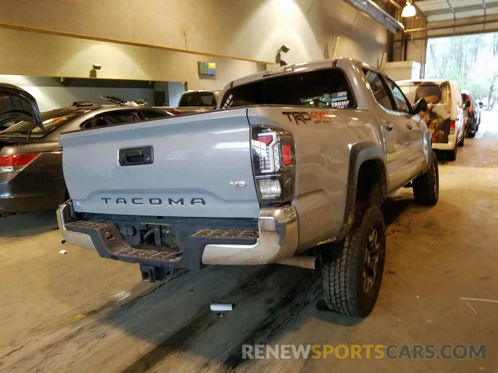 4 Photograph of a damaged car 3TMCZ5AN0KM205814 TOYOTA TACOMA 2019