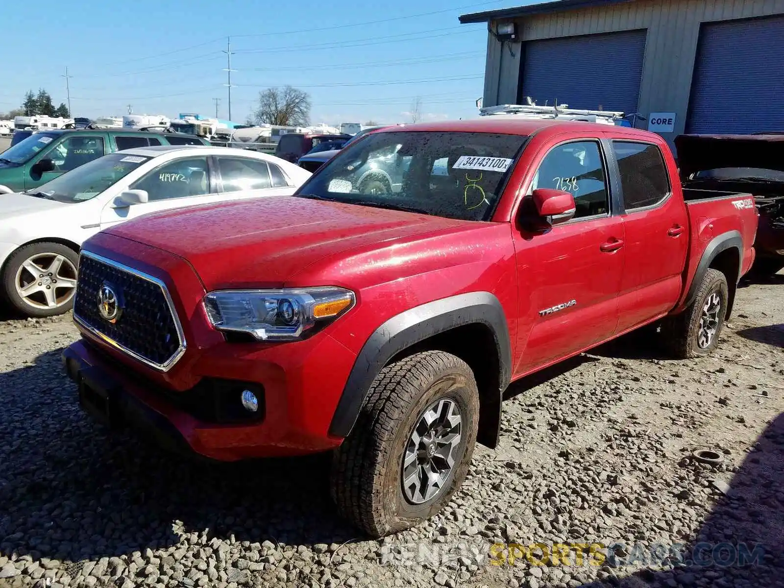 2 Photograph of a damaged car 3TMCZ5AN0KM206915 TOYOTA TACOMA 2019