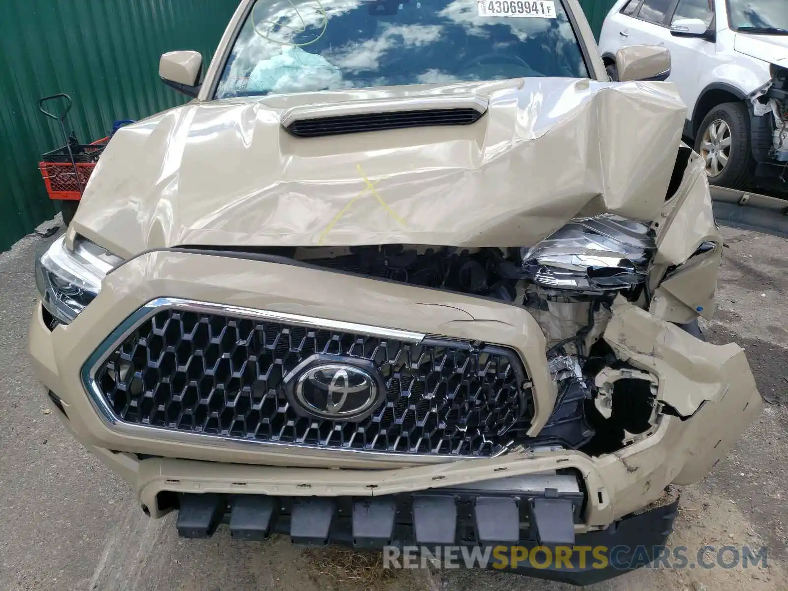 7 Photograph of a damaged car 3TMCZ5AN0KM207529 TOYOTA TACOMA 2019