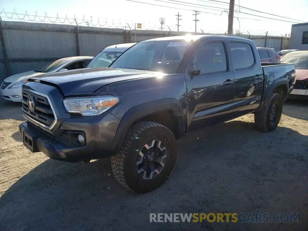 2 Photograph of a damaged car 3TMCZ5AN0KM209359 TOYOTA TACOMA 2019