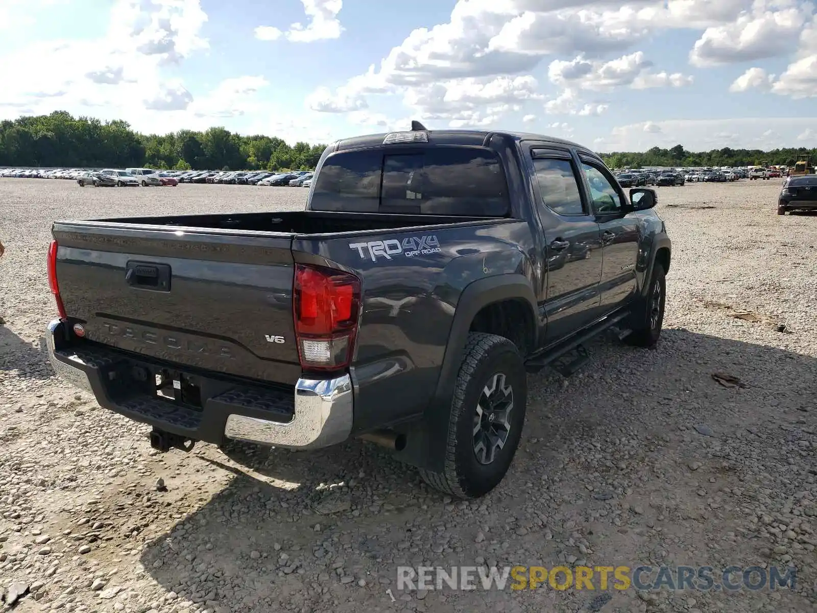 4 Photograph of a damaged car 3TMCZ5AN0KM210317 TOYOTA TACOMA 2019