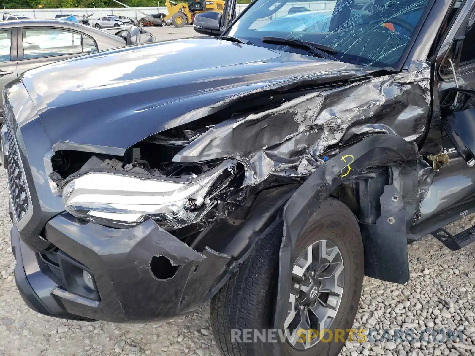 7 Photograph of a damaged car 3TMCZ5AN0KM210317 TOYOTA TACOMA 2019