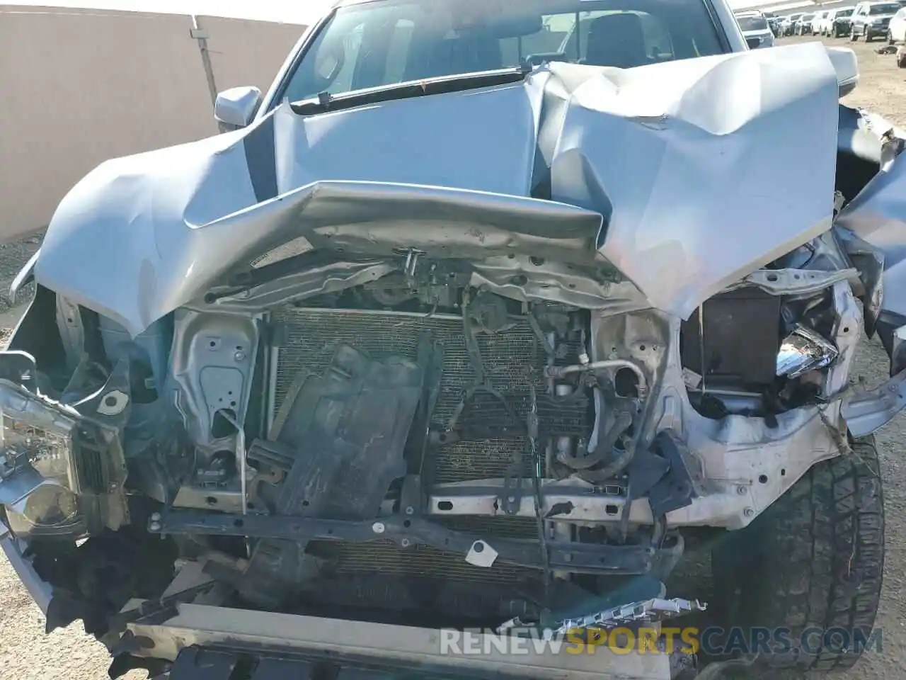 11 Photograph of a damaged car 3TMCZ5AN0KM212987 TOYOTA TACOMA 2019