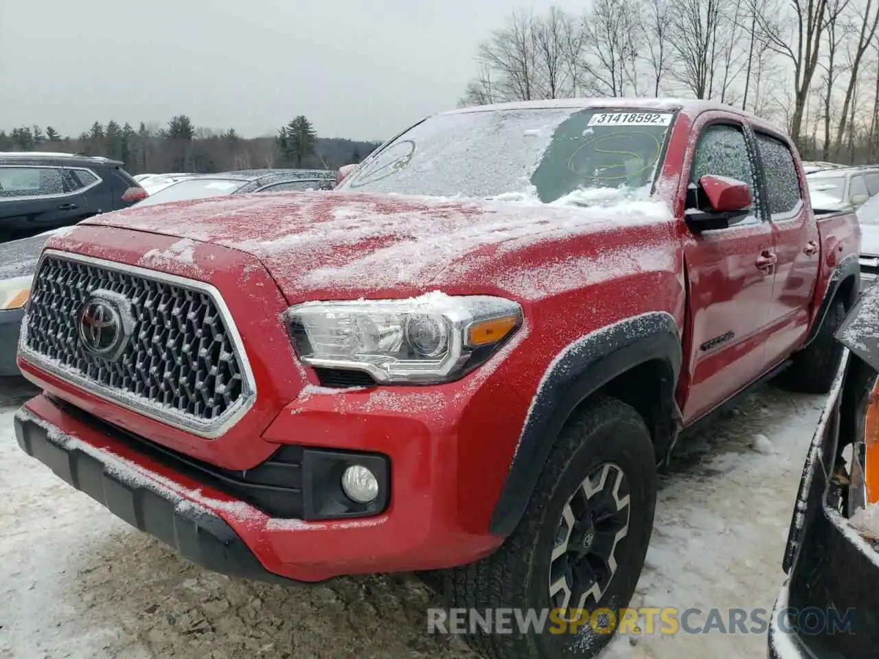 2 Photograph of a damaged car 3TMCZ5AN0KM214173 TOYOTA TACOMA 2019