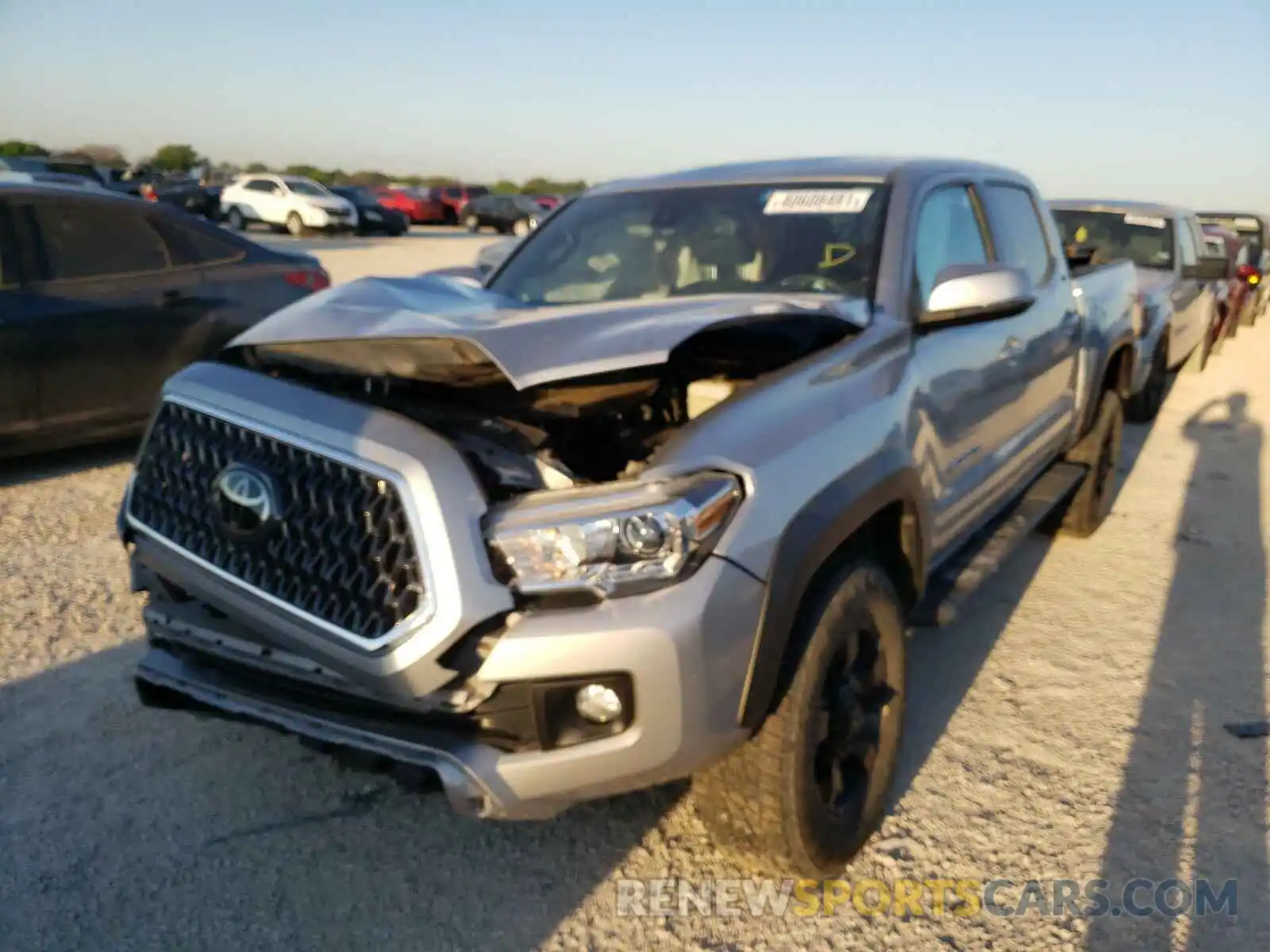 2 Photograph of a damaged car 3TMCZ5AN0KM216750 TOYOTA TACOMA 2019