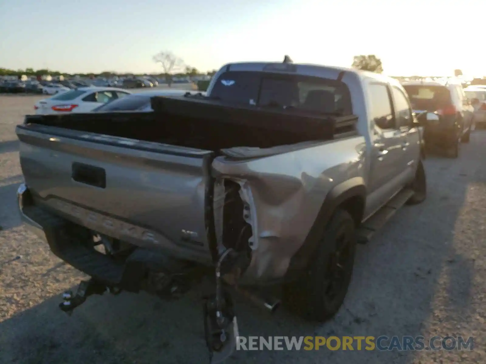 4 Photograph of a damaged car 3TMCZ5AN0KM216750 TOYOTA TACOMA 2019