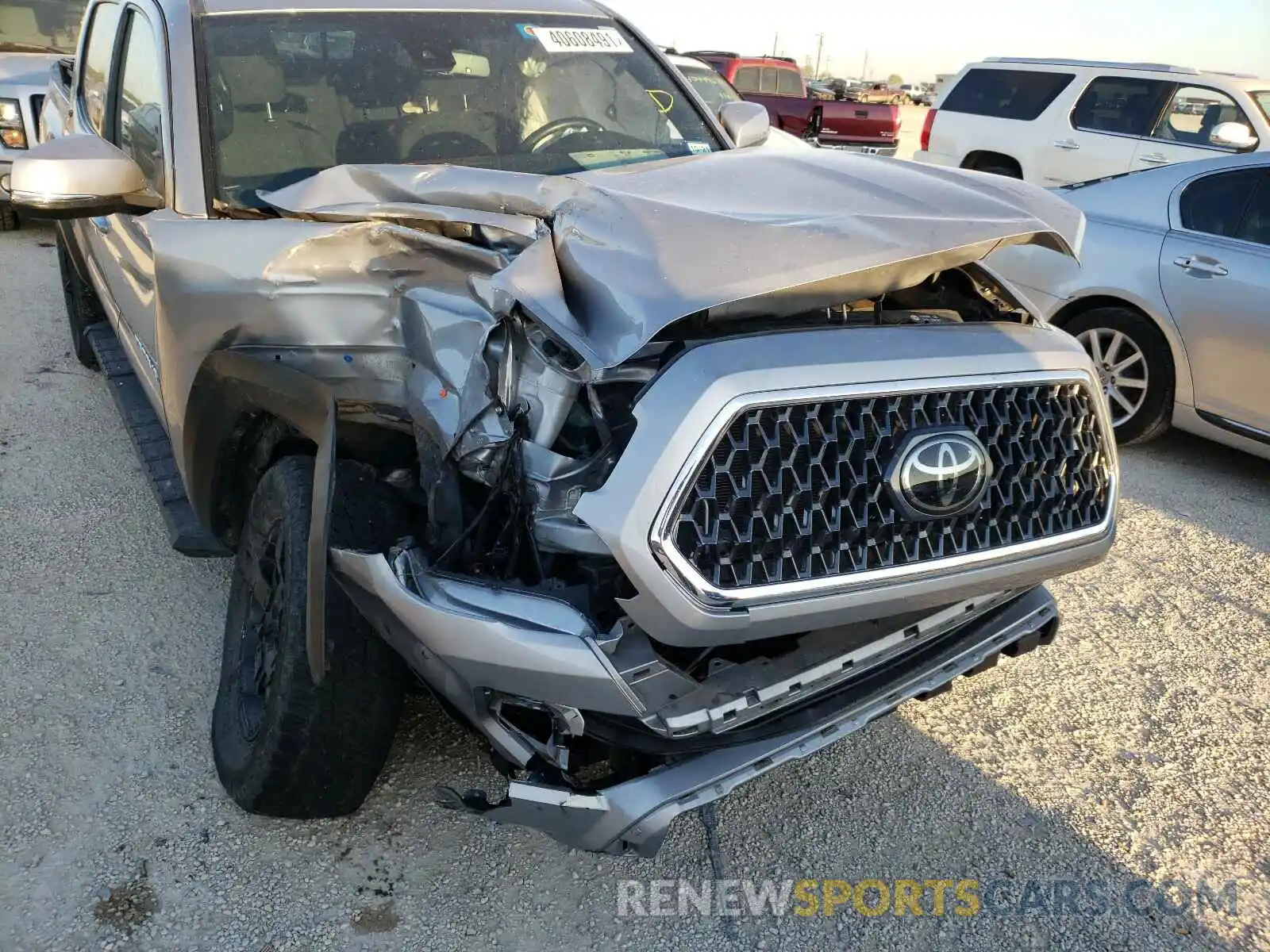 9 Photograph of a damaged car 3TMCZ5AN0KM216750 TOYOTA TACOMA 2019