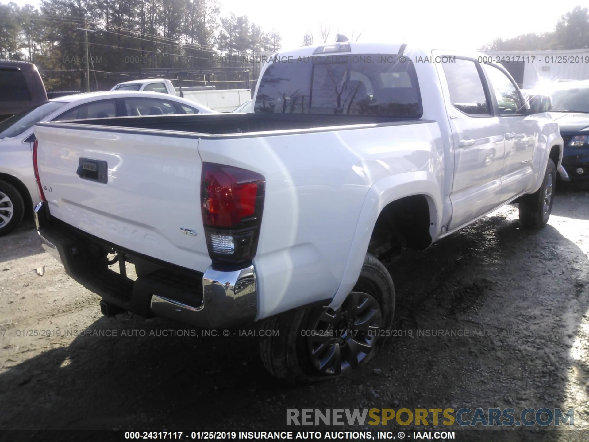 4 Photograph of a damaged car 3TMCZ5AN0KM216957 TOYOTA TACOMA 2019