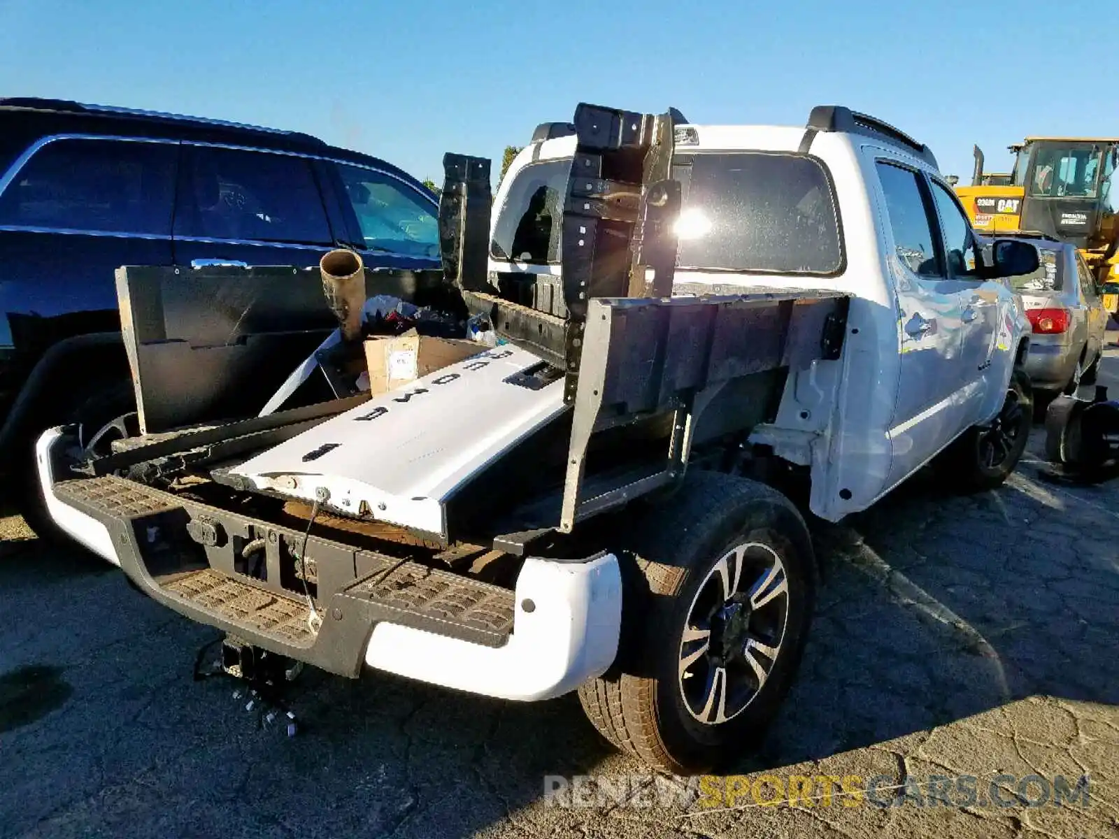 4 Photograph of a damaged car 3TMCZ5AN0KM217980 TOYOTA TACOMA 2019