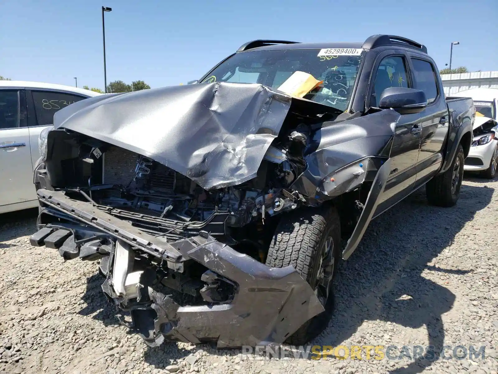 2 Photograph of a damaged car 3TMCZ5AN0KM218689 TOYOTA TACOMA 2019