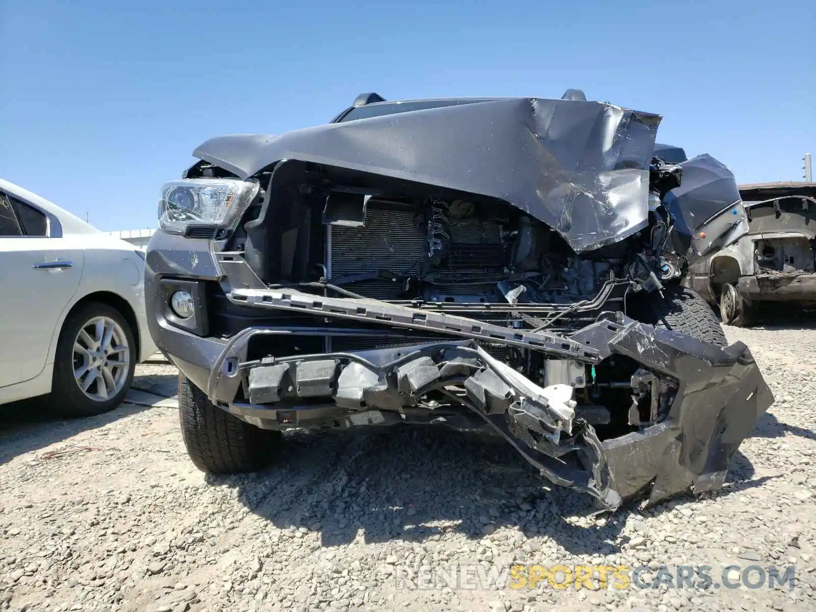 9 Photograph of a damaged car 3TMCZ5AN0KM218689 TOYOTA TACOMA 2019