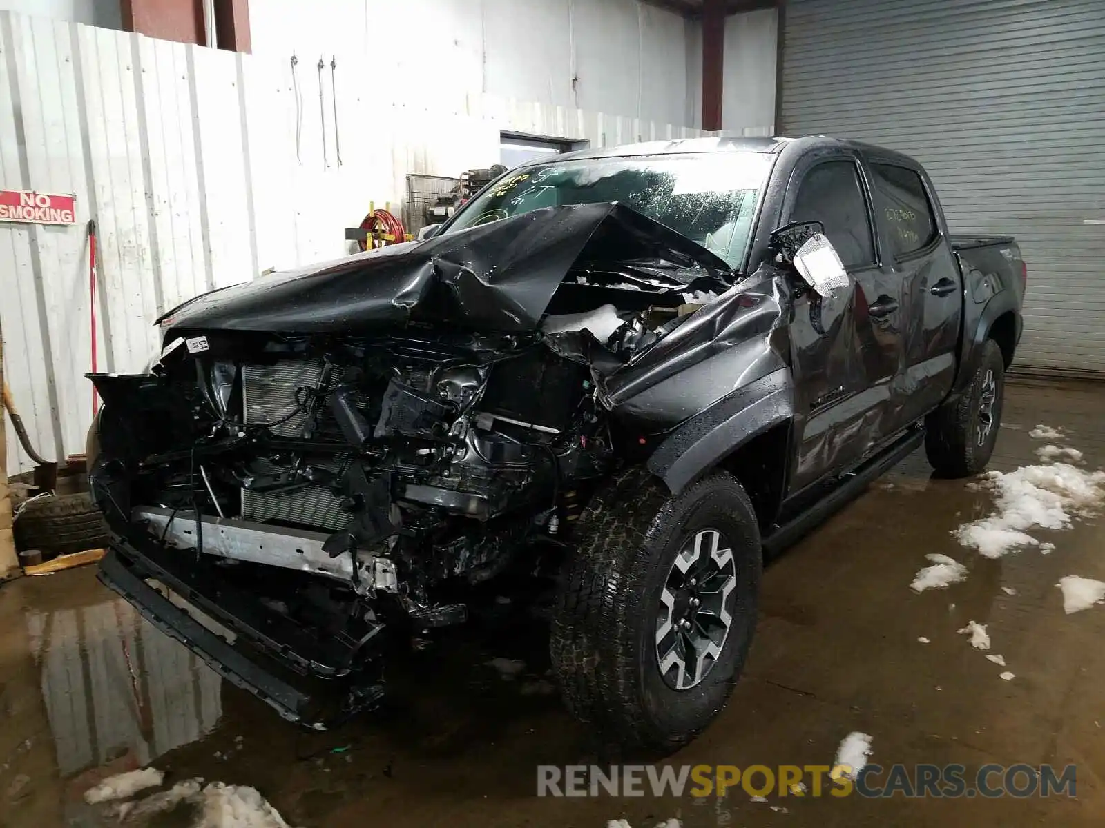 2 Photograph of a damaged car 3TMCZ5AN0KM218885 TOYOTA TACOMA 2019