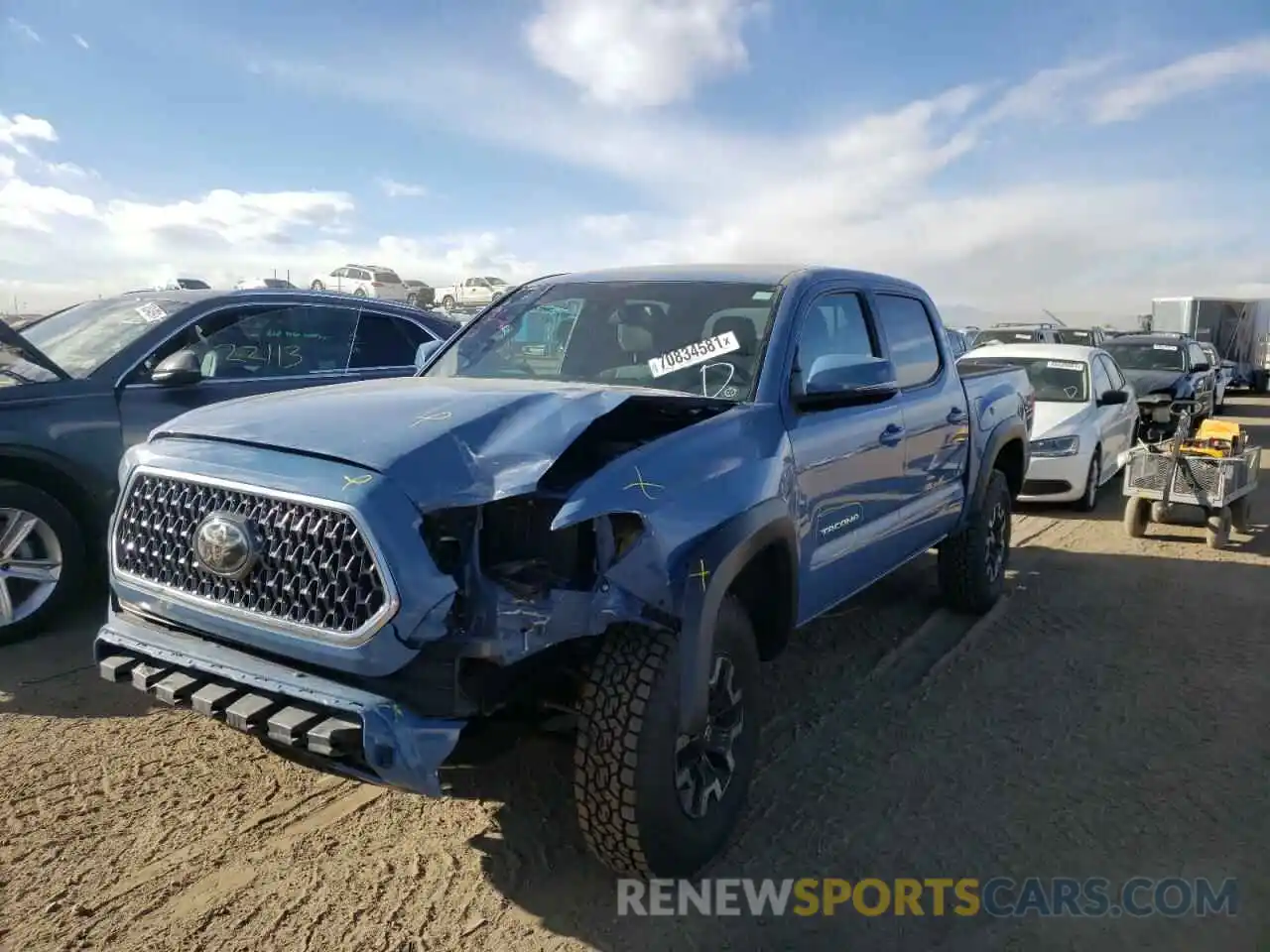 2 Photograph of a damaged car 3TMCZ5AN0KM224167 TOYOTA TACOMA 2019