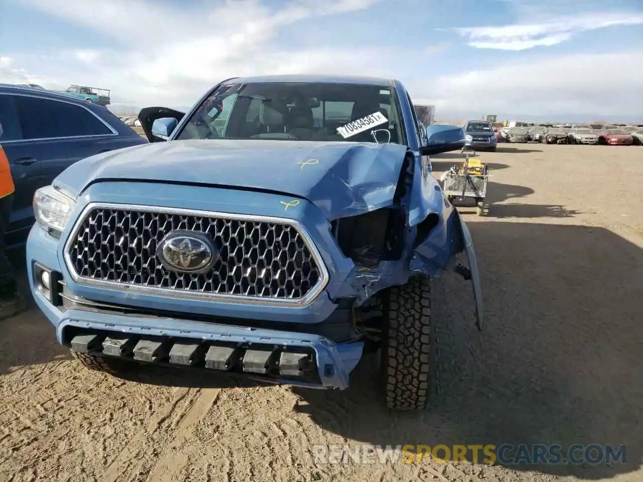 9 Photograph of a damaged car 3TMCZ5AN0KM224167 TOYOTA TACOMA 2019