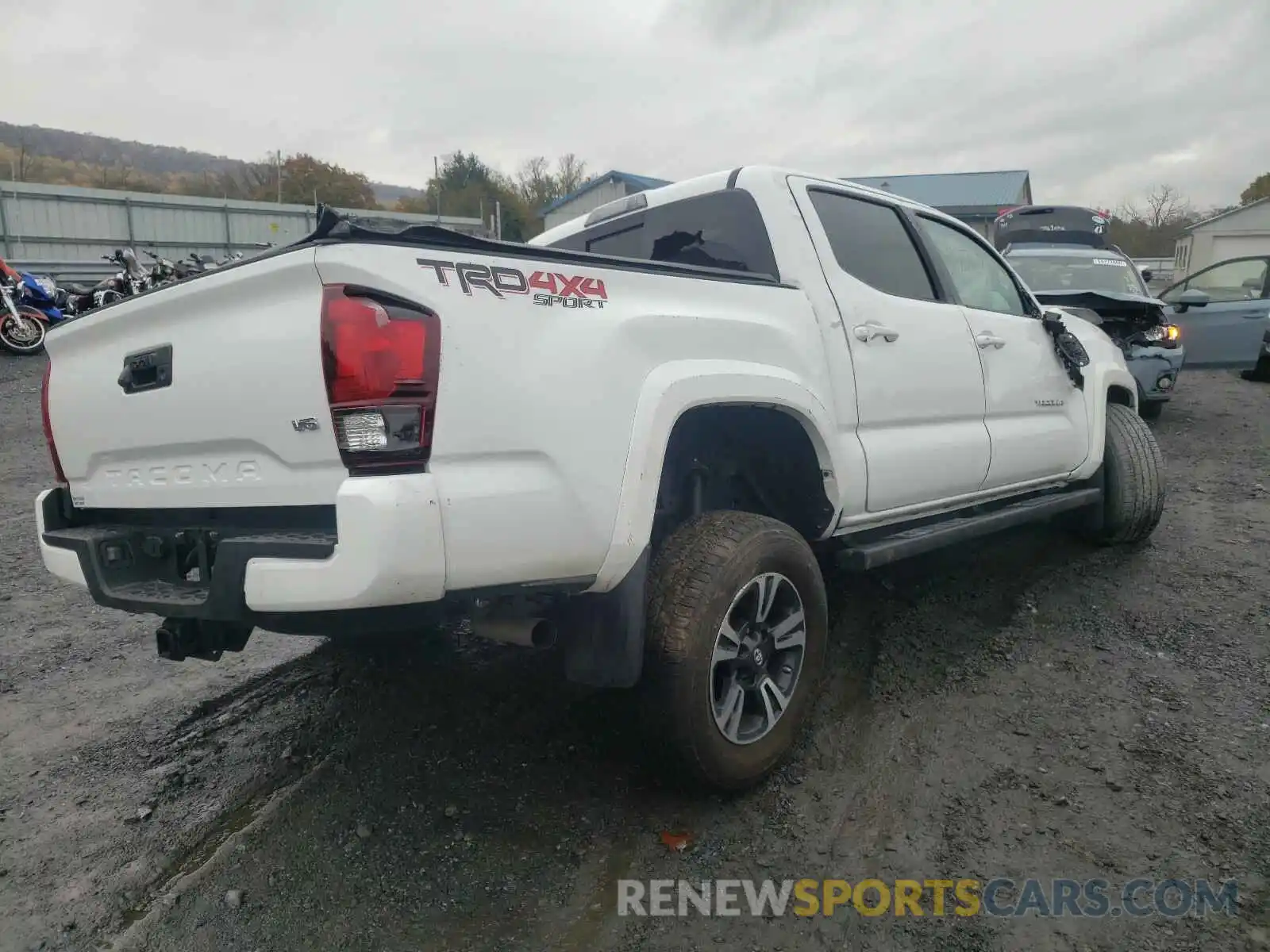 4 Photograph of a damaged car 3TMCZ5AN0KM224184 TOYOTA TACOMA 2019