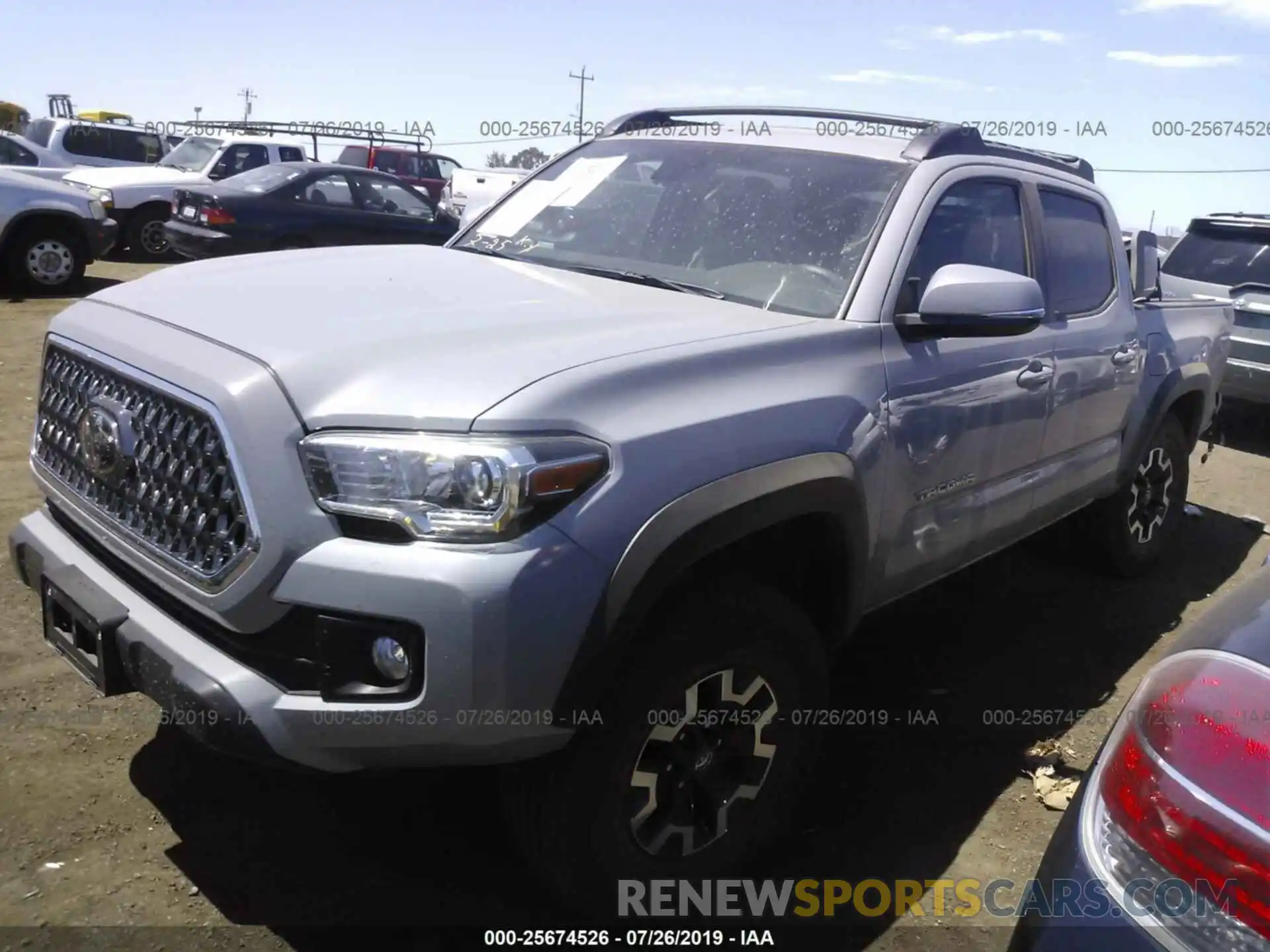 2 Photograph of a damaged car 3TMCZ5AN0KM226811 TOYOTA TACOMA 2019