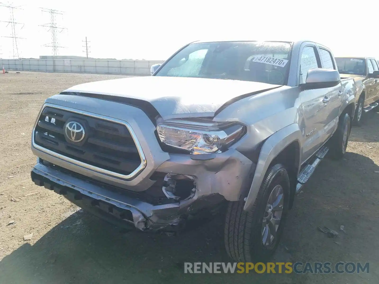 2 Photograph of a damaged car 3TMCZ5AN0KM230843 TOYOTA TACOMA 2019