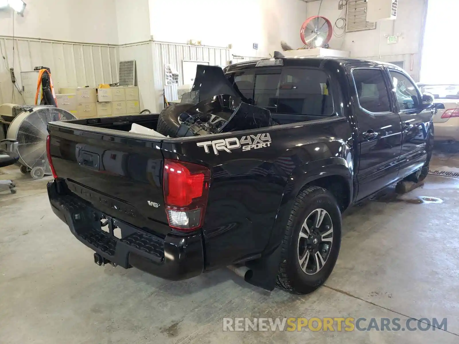 4 Photograph of a damaged car 3TMCZ5AN0KM232074 TOYOTA TACOMA 2019