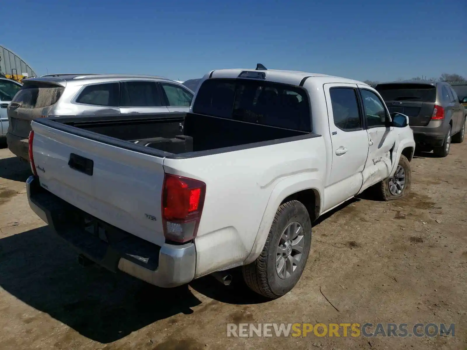 4 Photograph of a damaged car 3TMCZ5AN0KM233032 TOYOTA TACOMA 2019