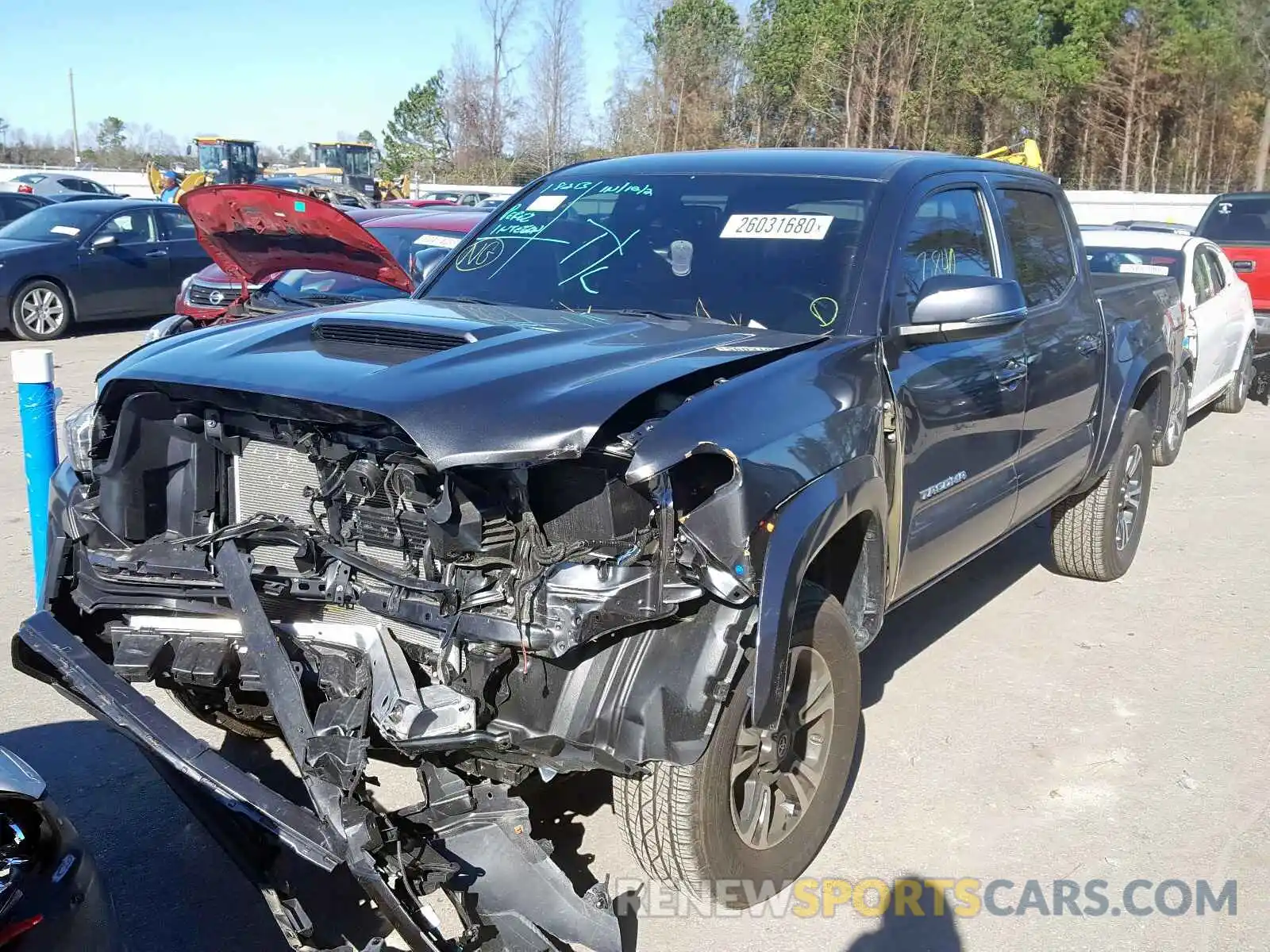 2 Photograph of a damaged car 3TMCZ5AN0KM233371 TOYOTA TACOMA 2019