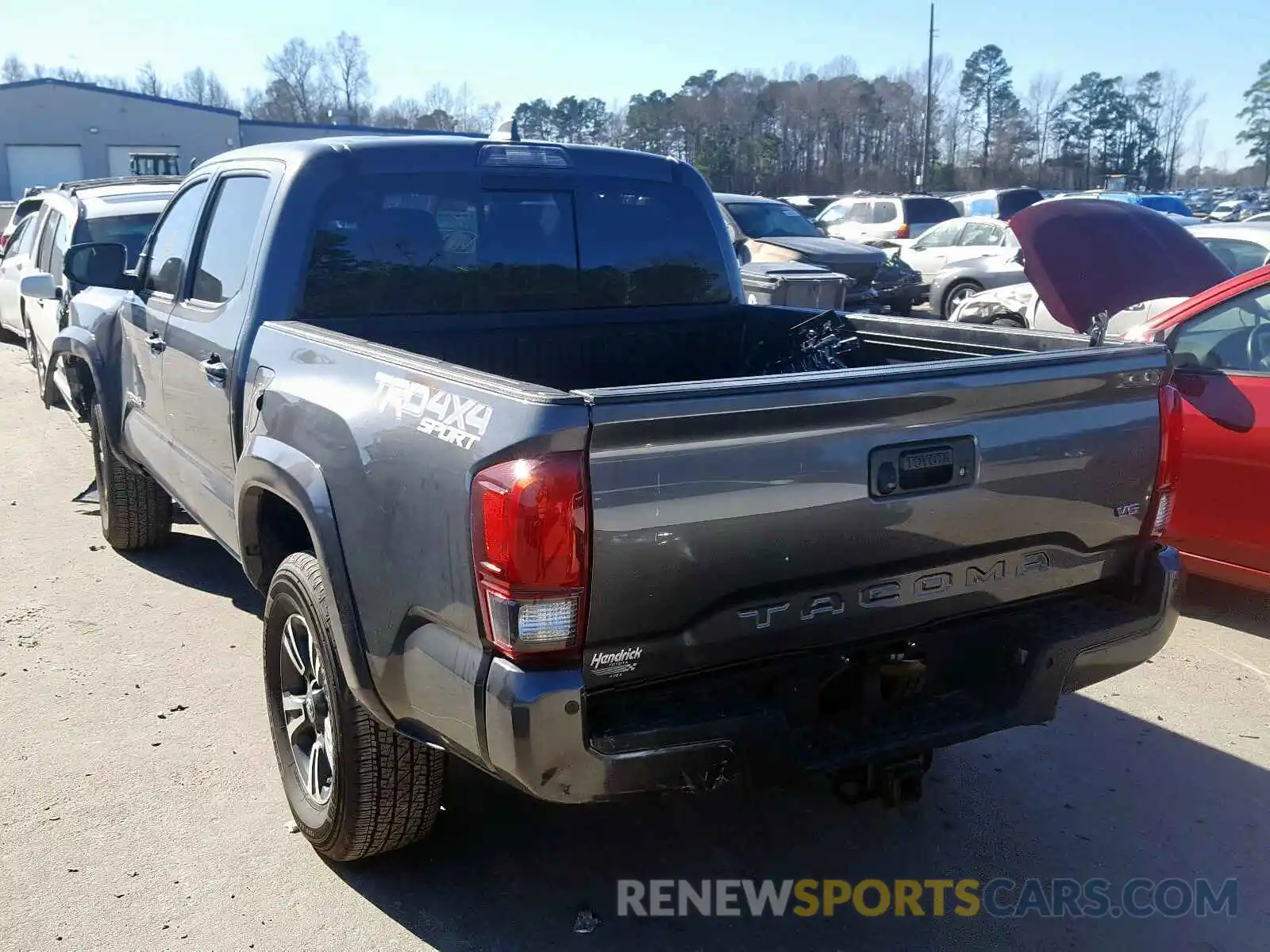 3 Photograph of a damaged car 3TMCZ5AN0KM233371 TOYOTA TACOMA 2019