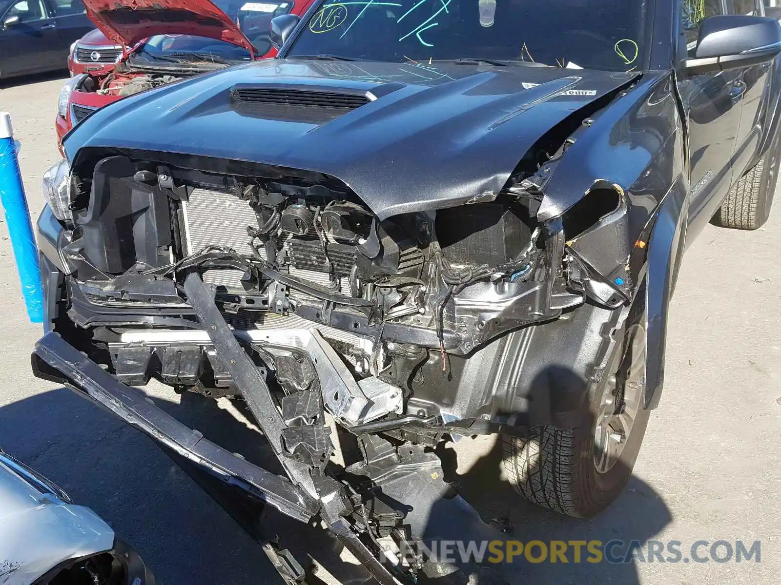 9 Photograph of a damaged car 3TMCZ5AN0KM233371 TOYOTA TACOMA 2019