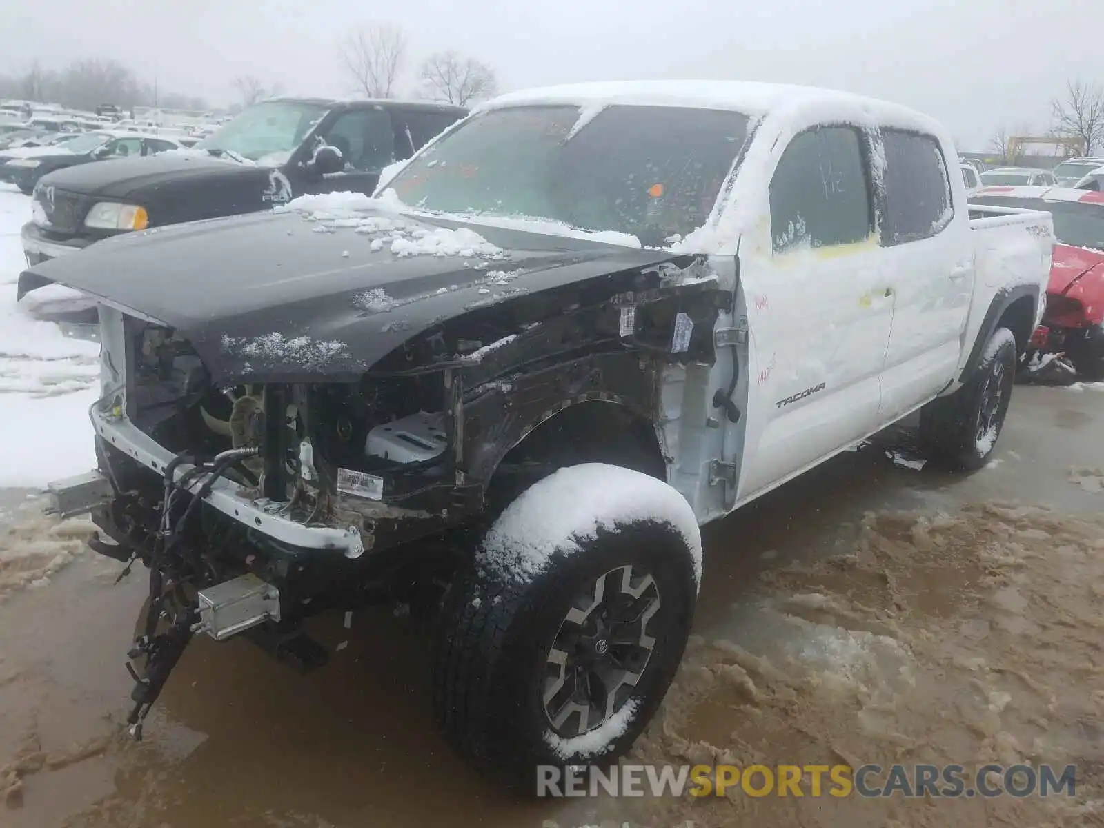 2 Photograph of a damaged car 3TMCZ5AN0KM233984 TOYOTA TACOMA 2019