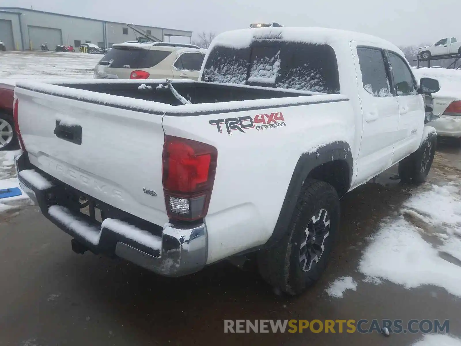 4 Photograph of a damaged car 3TMCZ5AN0KM233984 TOYOTA TACOMA 2019