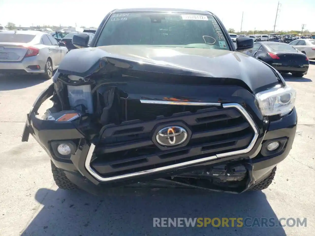 7 Photograph of a damaged car 3TMCZ5AN0KM234522 TOYOTA TACOMA 2019