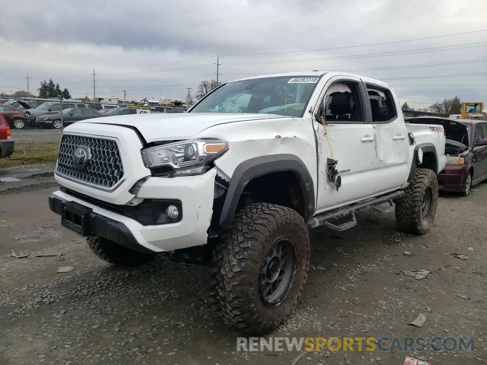 2 Photograph of a damaged car 3TMCZ5AN0KM236013 TOYOTA TACOMA 2019