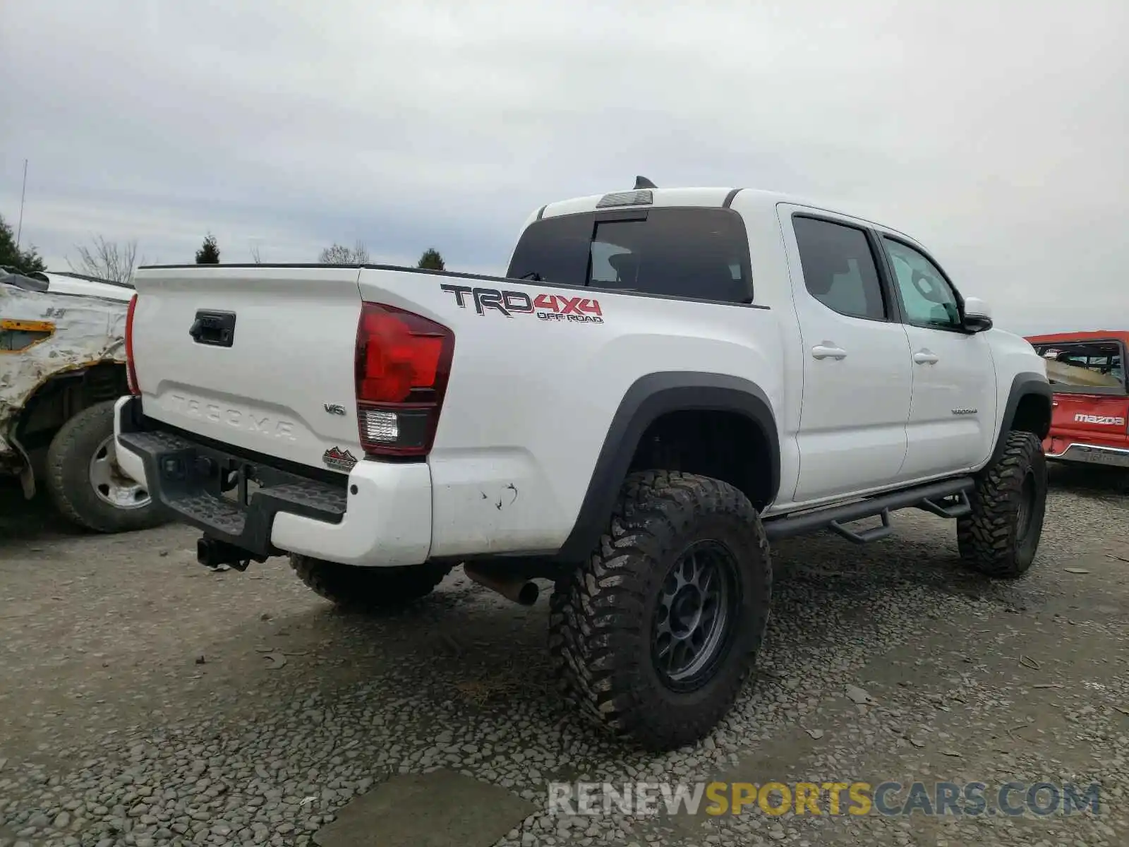 4 Photograph of a damaged car 3TMCZ5AN0KM236013 TOYOTA TACOMA 2019