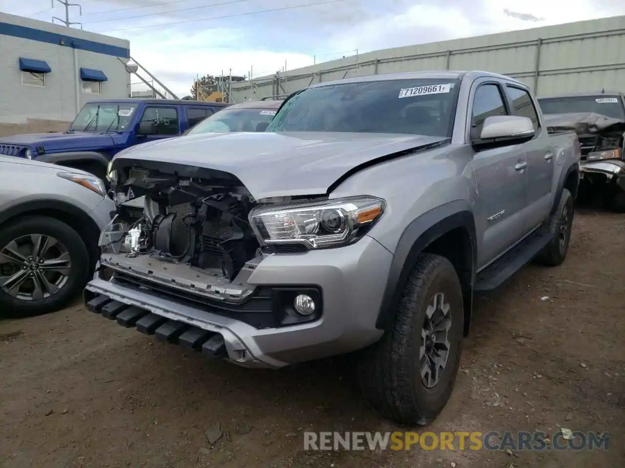 2 Photograph of a damaged car 3TMCZ5AN0KM241258 TOYOTA TACOMA 2019