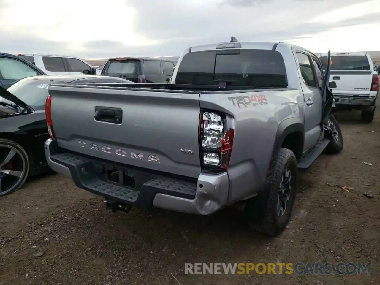 4 Photograph of a damaged car 3TMCZ5AN0KM241258 TOYOTA TACOMA 2019