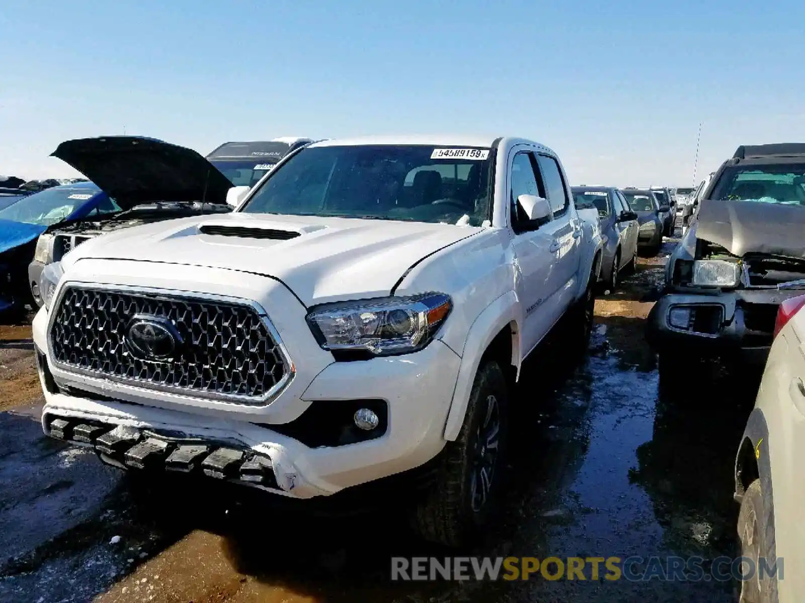 2 Photograph of a damaged car 3TMCZ5AN0KM241809 TOYOTA TACOMA 2019