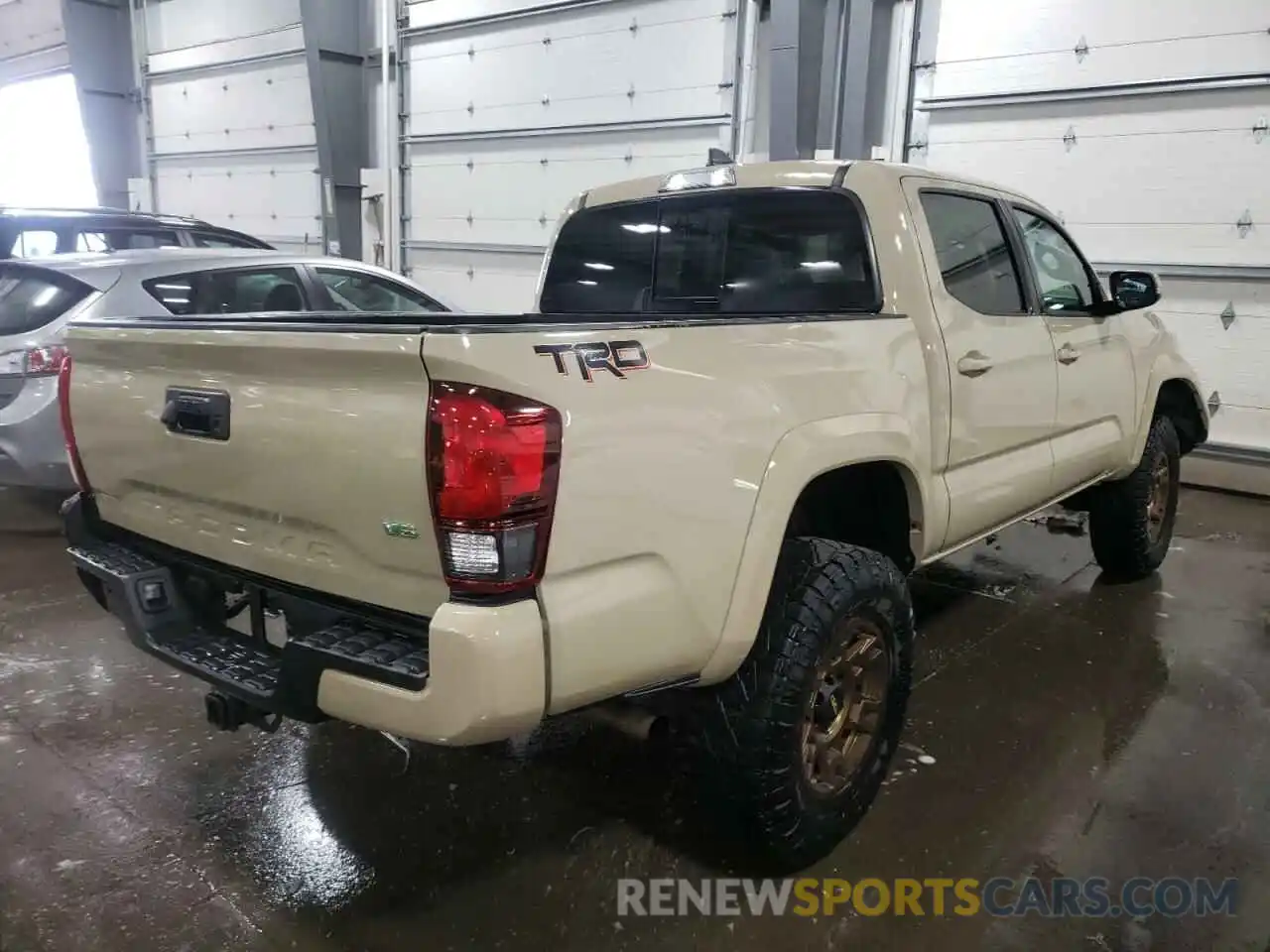 4 Photograph of a damaged car 3TMCZ5AN0KM243043 TOYOTA TACOMA 2019