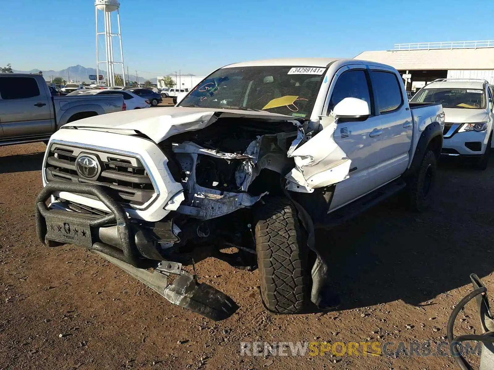 2 Photograph of a damaged car 3TMCZ5AN0KM244516 TOYOTA TACOMA 2019