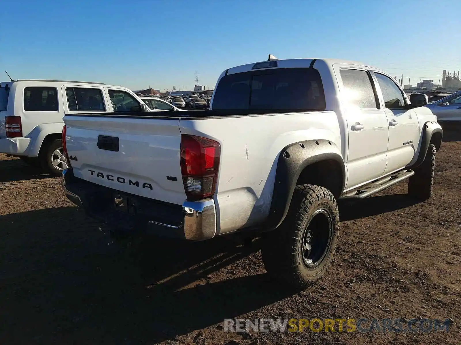 4 Photograph of a damaged car 3TMCZ5AN0KM244516 TOYOTA TACOMA 2019