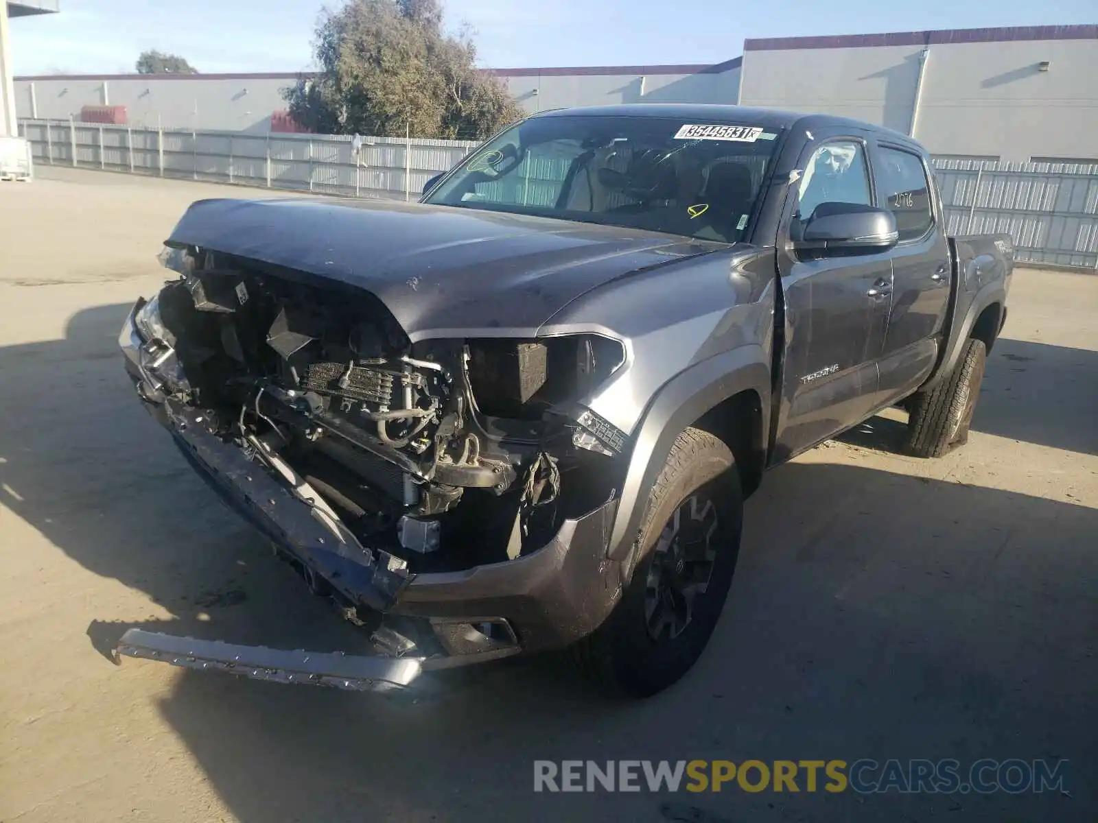 2 Photograph of a damaged car 3TMCZ5AN0KM246878 TOYOTA TACOMA 2019