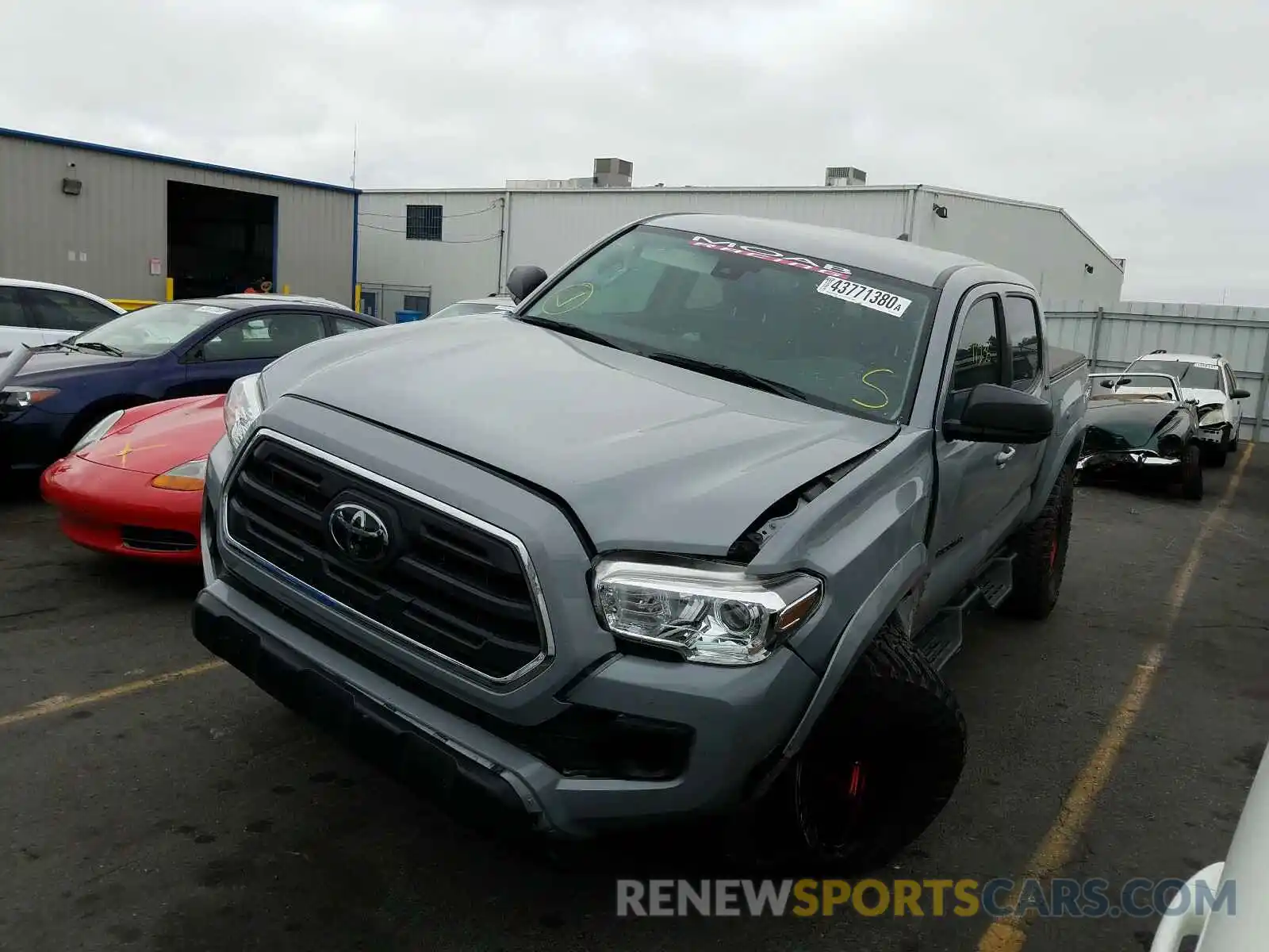 2 Photograph of a damaged car 3TMCZ5AN0KM250171 TOYOTA TACOMA 2019