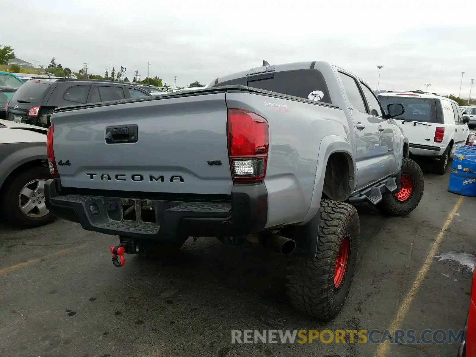 4 Photograph of a damaged car 3TMCZ5AN0KM250171 TOYOTA TACOMA 2019