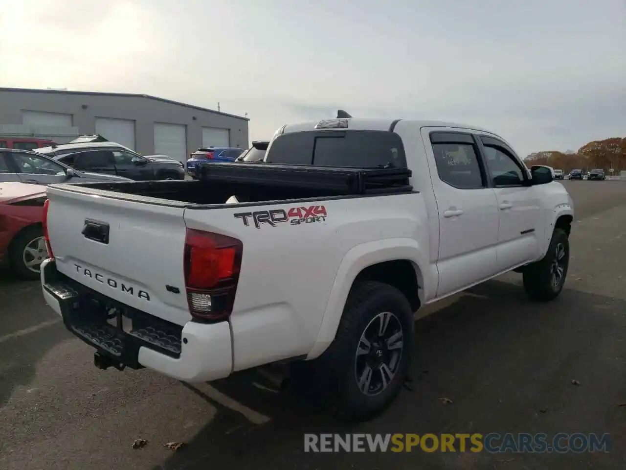 4 Photograph of a damaged car 3TMCZ5AN0KM250719 TOYOTA TACOMA 2019