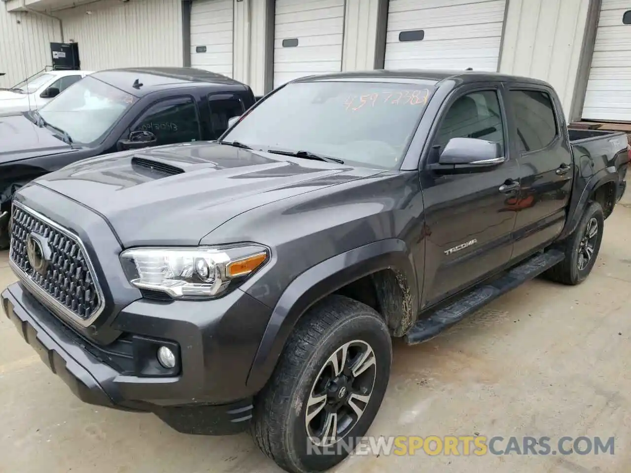 2 Photograph of a damaged car 3TMCZ5AN0KM255628 TOYOTA TACOMA 2019