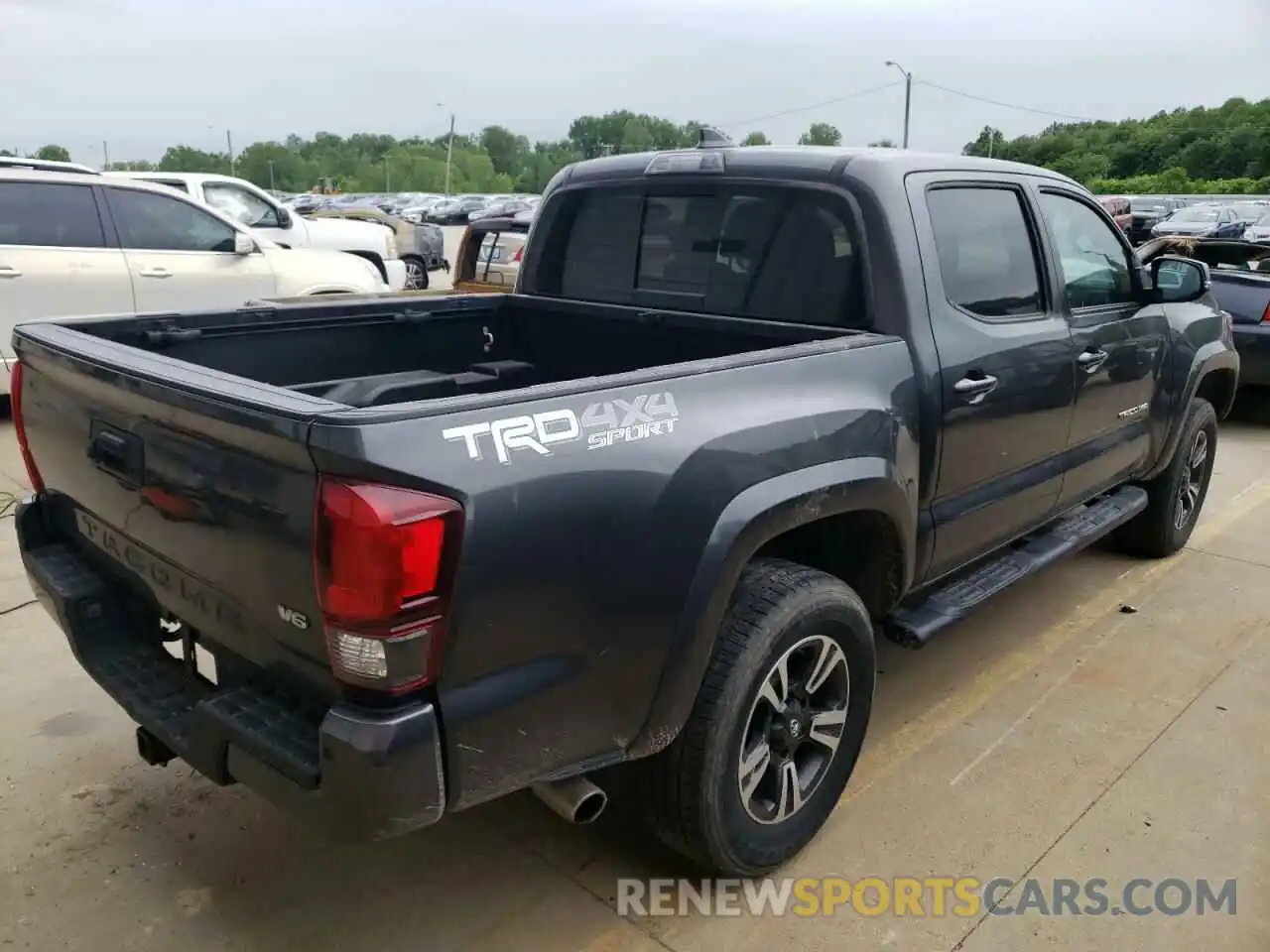 4 Photograph of a damaged car 3TMCZ5AN0KM255628 TOYOTA TACOMA 2019