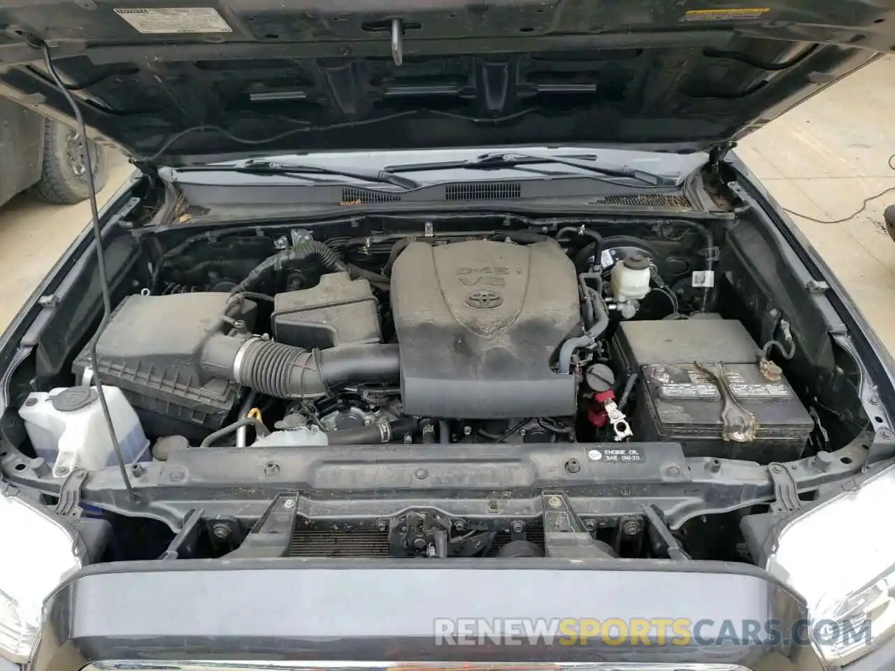 7 Photograph of a damaged car 3TMCZ5AN0KM255628 TOYOTA TACOMA 2019